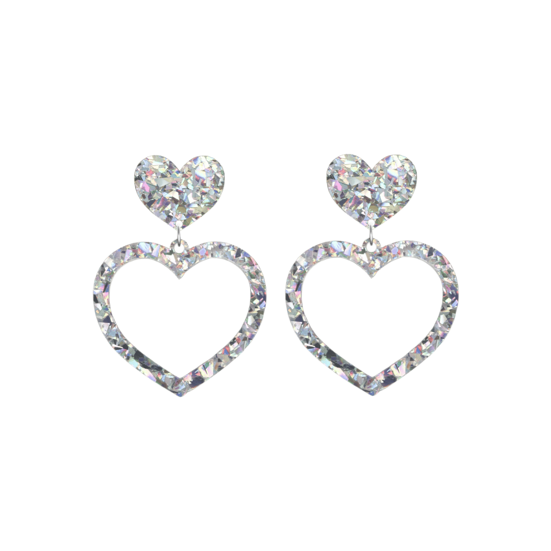 haus of dizzy crystal barbie hearts in clear quartz size small. hearts are filled with silver/clear holographic foil/glitter