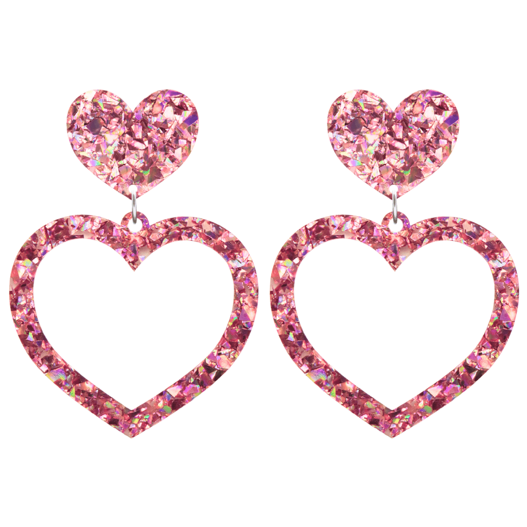 haus of dizzy crystal barbie hearts in rose quartz size large. hearts are filled with pink holographic foil/glitter