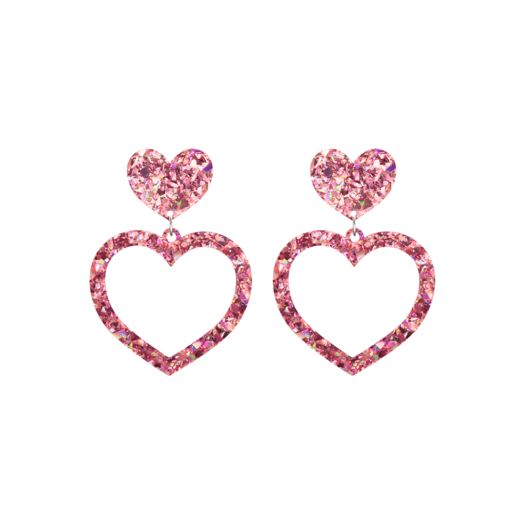 haus of dizzy crystal barbie hearts in rose quartz size small. hearts are filled with pink holographic foil/glitter