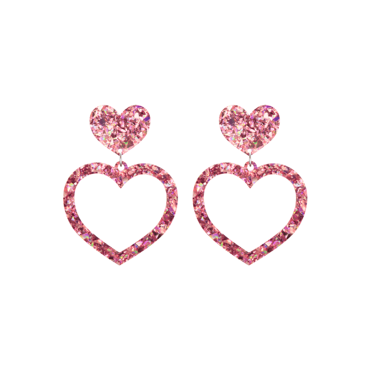haus of dizzy crystal barbie hearts in rose quartz size small. hearts are filled with pink holographic foil/glitter