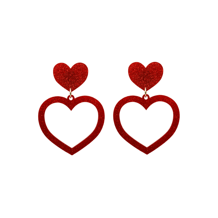 haus of dizzy glitter barbie heart earrings with red glitter size small