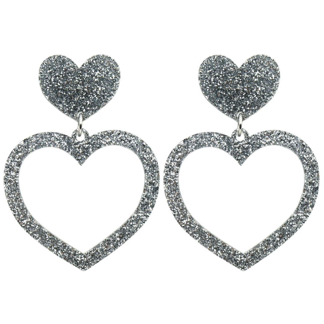 haus of dizzy glitter barbie heart earrings with silver glitter size large