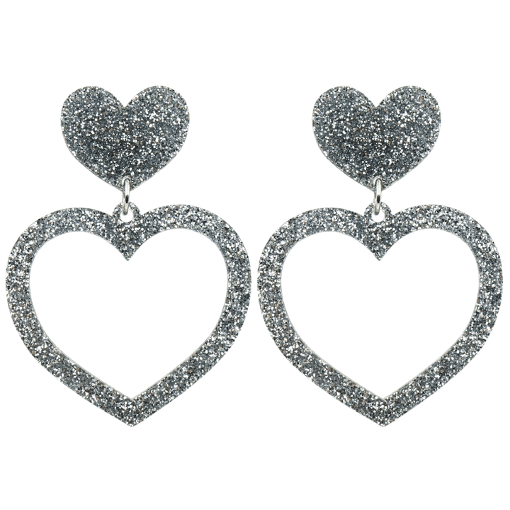haus of dizzy glitter barbie heart earrings with silver glitter size large