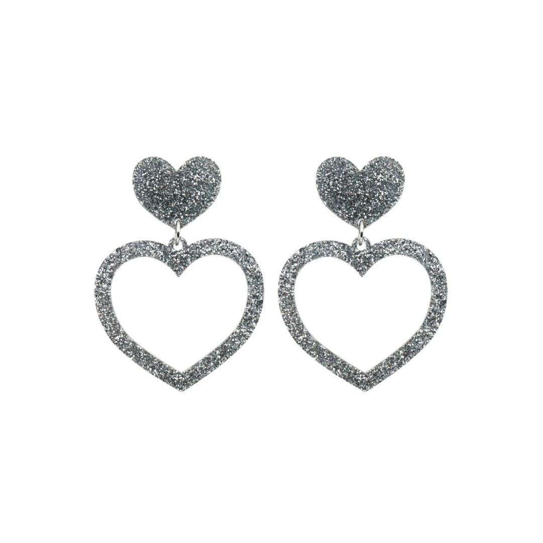 haus of dizzy glitter barbie heart earrings with silver glitter size small
