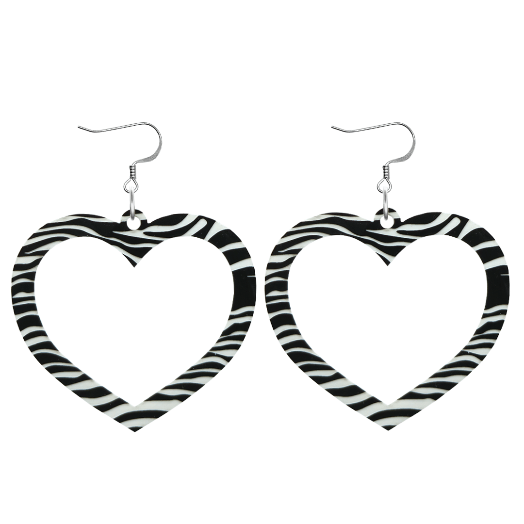 haus of dizzy black and white barbie heart earrings in zebra print size large with hooks no heart tops