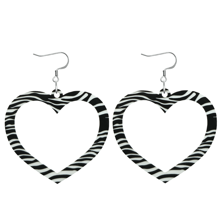haus of dizzy black and white barbie heart earrings in zebra print size large with hooks no heart tops