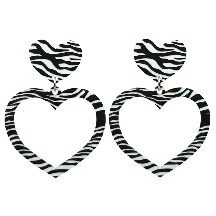 haus of dizzy black and white barbie heart earrings in zebra print size large 