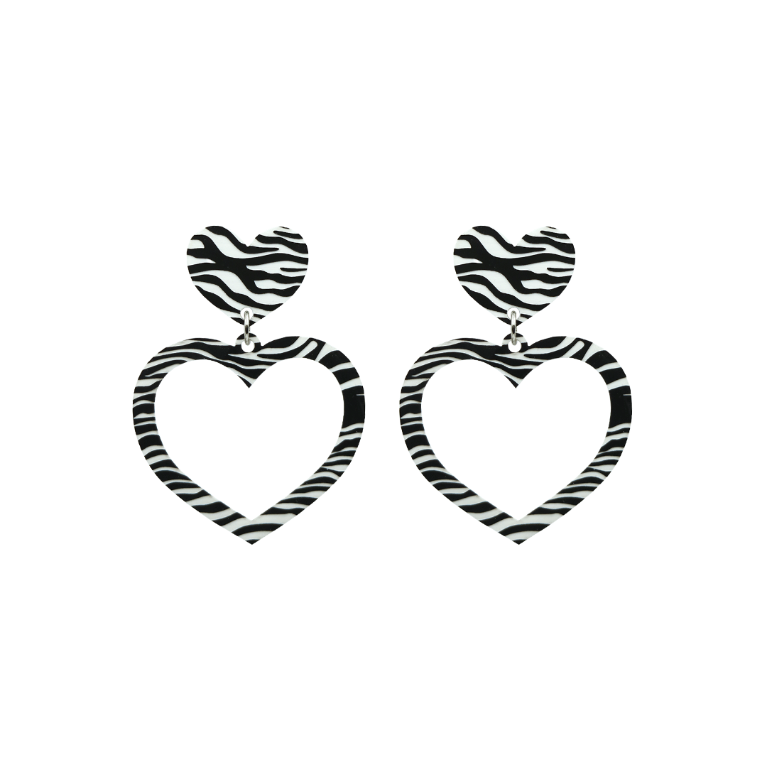 haus of dizzy black and white barbie heart earrings in zebra print size small