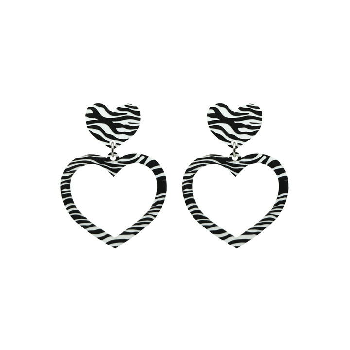 haus of dizzy black and white barbie heart earrings in zebra print size small