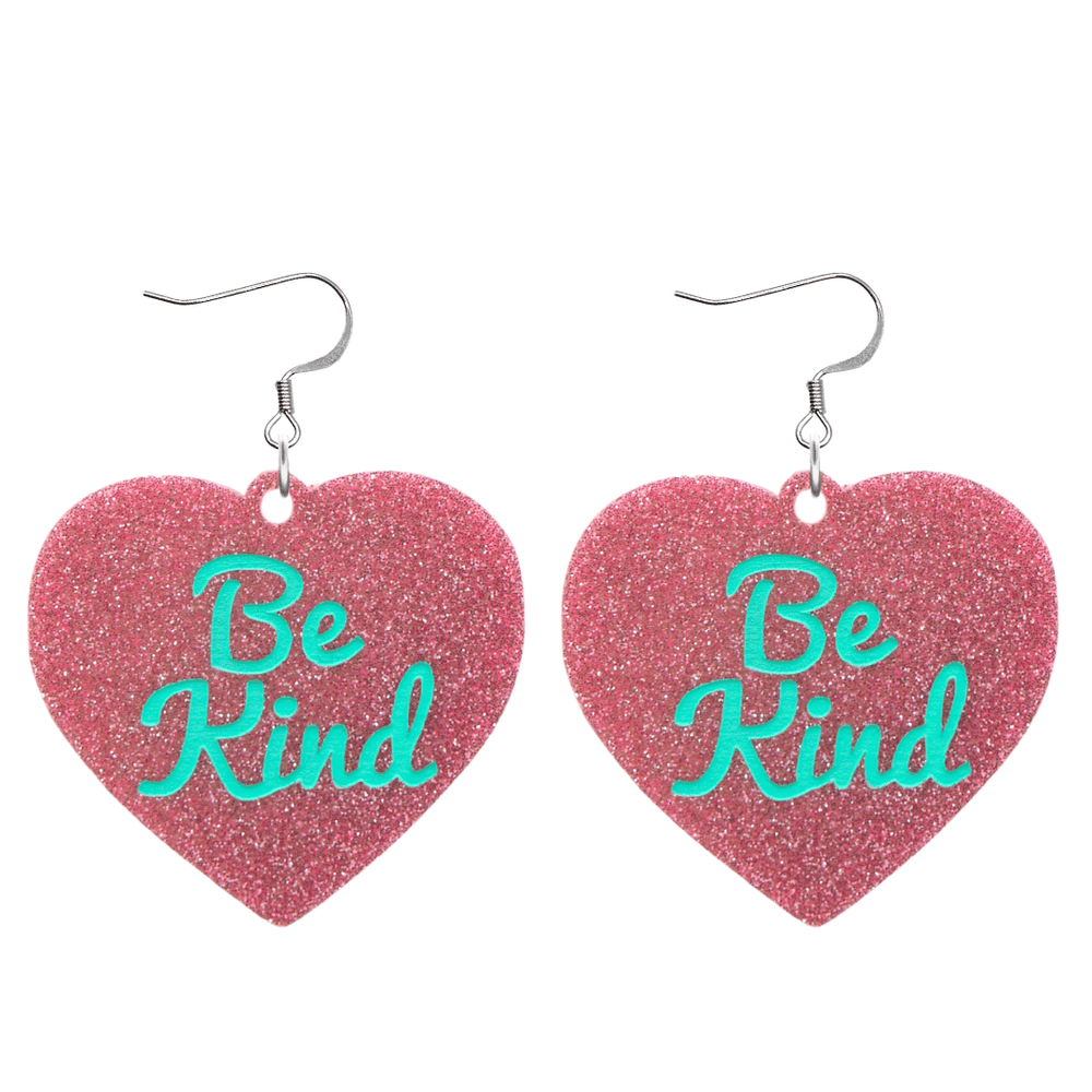 haus of dizzy baby pink glitter heart-shaped acrylic earrings with turquoise 'Be Kind' text and silver hooks no heart tops size large