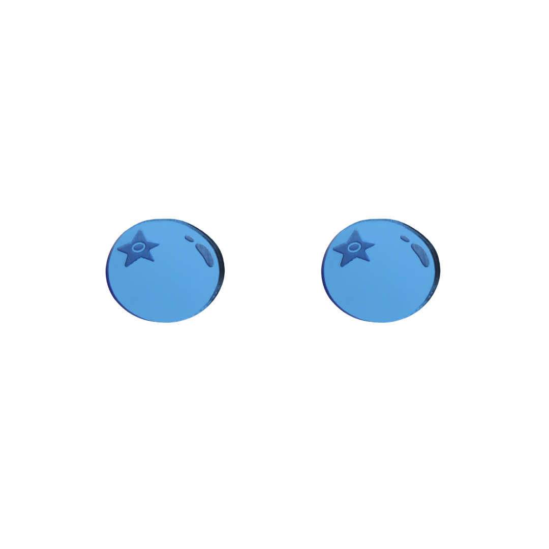 An image of Haus of Dizzy's berry blue, blueberry-shaped studs, with mirror blue acrylic. 