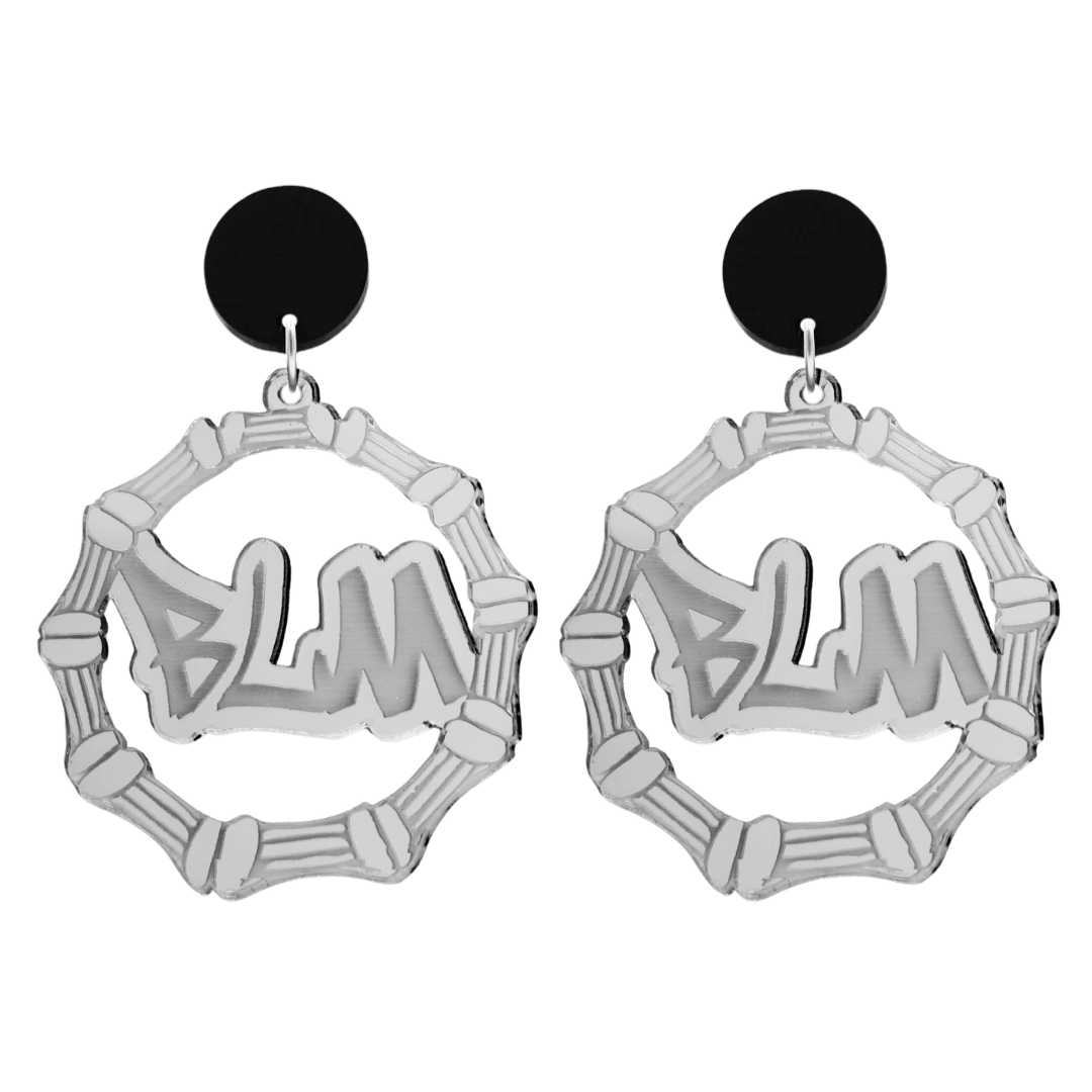 haus of dizzy acrylic silver mirror bamboo hoops with graffiti text that reads BLM with black circle stud tops size large