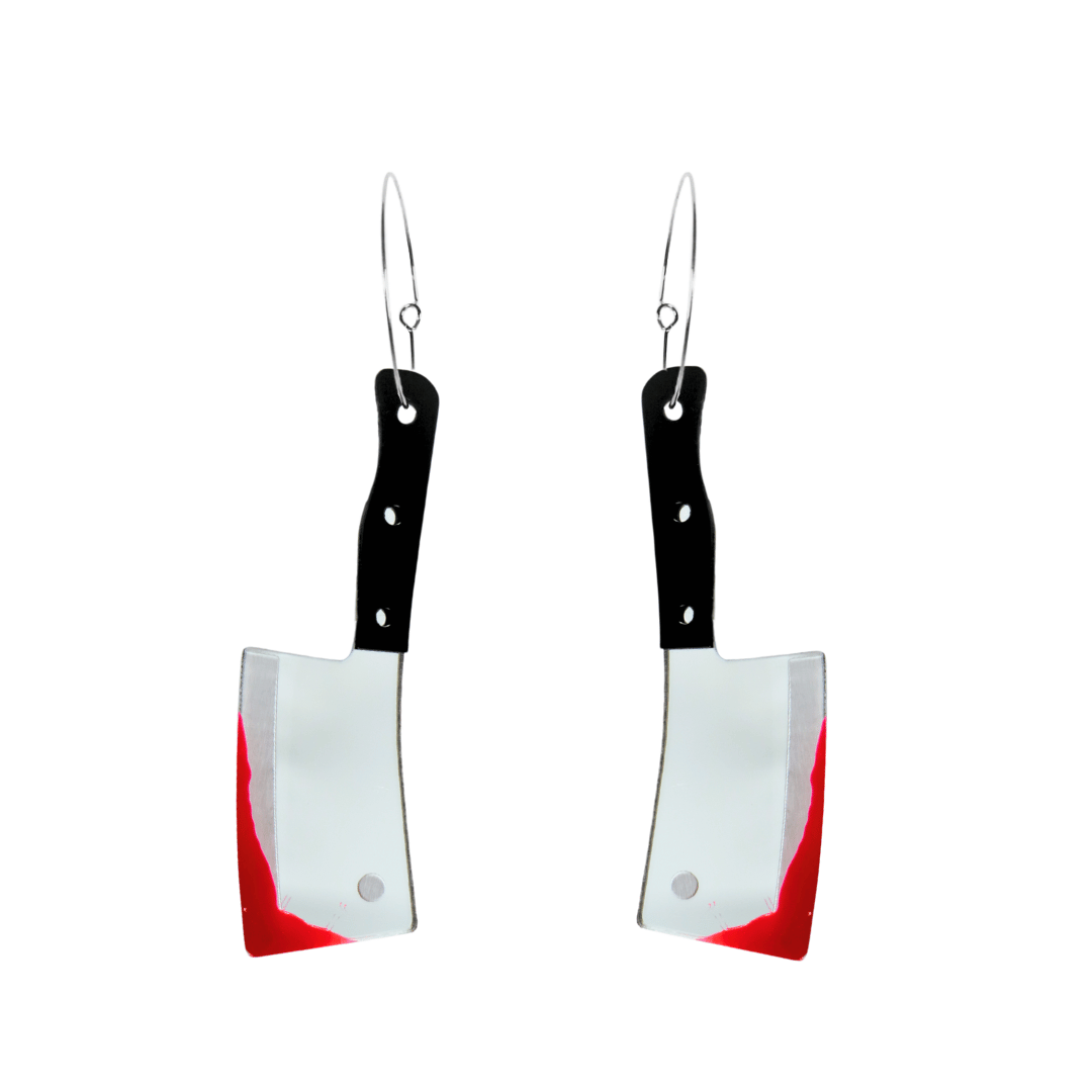 Haus of dizzy cleaver shaped earrings with black handles and silver blades with red blood detail on a white background