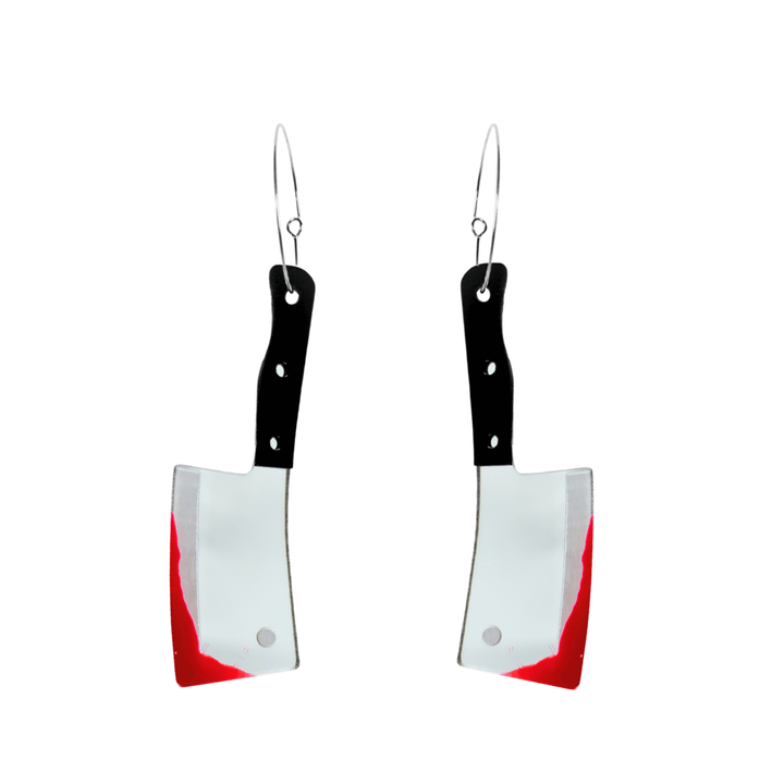Haus of dizzy cleaver shaped earrings with black handles and silver blades with red blood detail on a white background