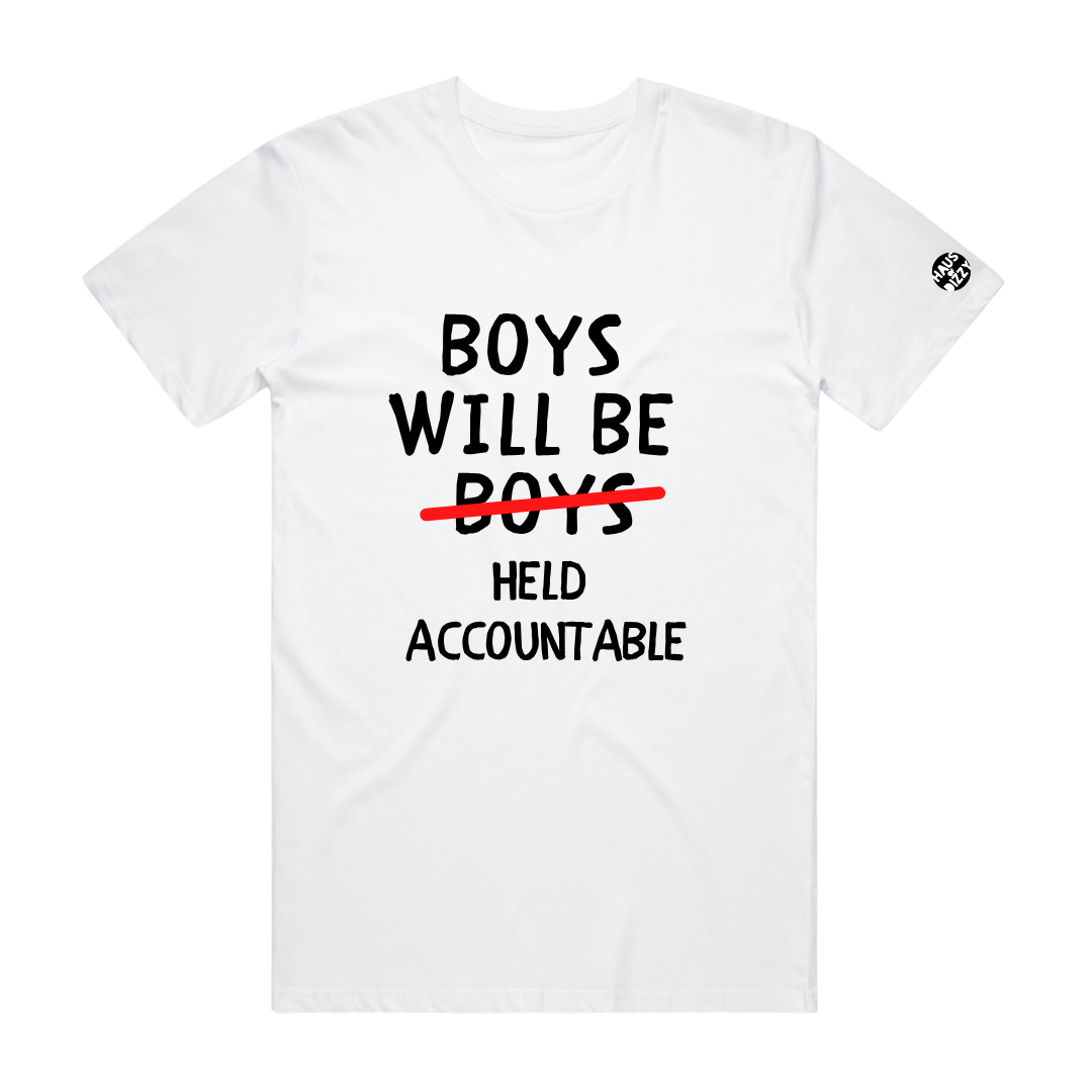 haus of dizzys white tshirt with black text reading 'BOYS WILL BE BOYS' and a red line crossing out 'BOYS', followed by 'HELD ACCOUNTABLE' in black. A small circular haus of dizzy logo is printed on the left sleeve