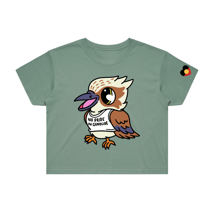 Sage green crop t-shirt with a cartoon kookaburra, Cookie, on front. he is wearing a singlet that reads 'No pride in genocide'. the t-shirt is on a white background