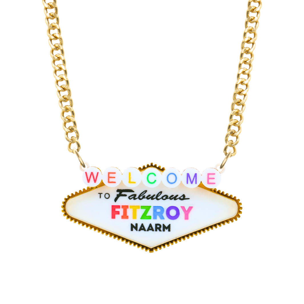 haus of dizzy necklace with a custom 'Welcome to Fabulous Fitzroy Naarm' sign pendant, featuring colorful lettering on gold chain