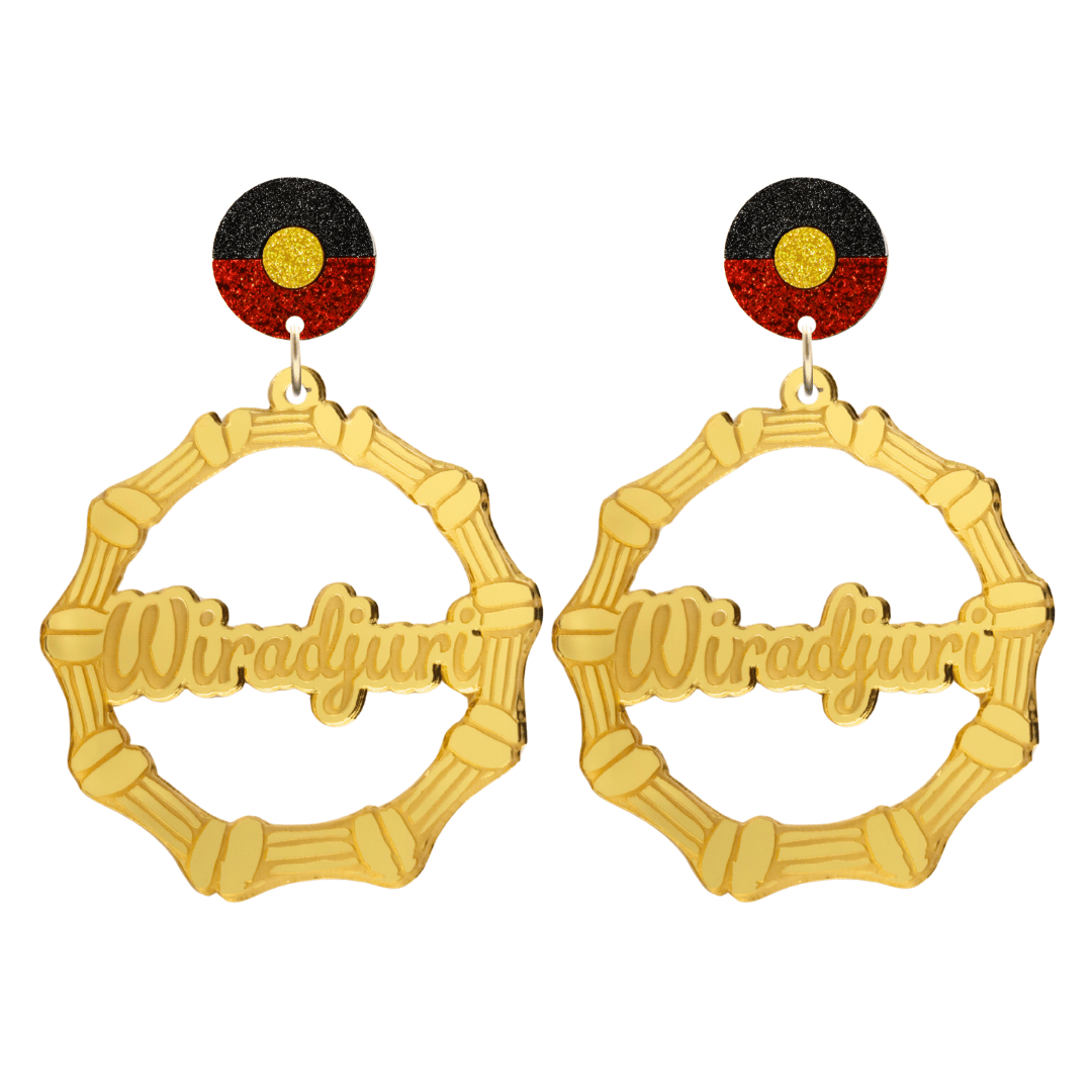 haus of dizzy gold mirror acrylic bamboo hoop custom earrings with 'Wiradjuri' ollie cursive text and Aboriginal flag design stud top size large