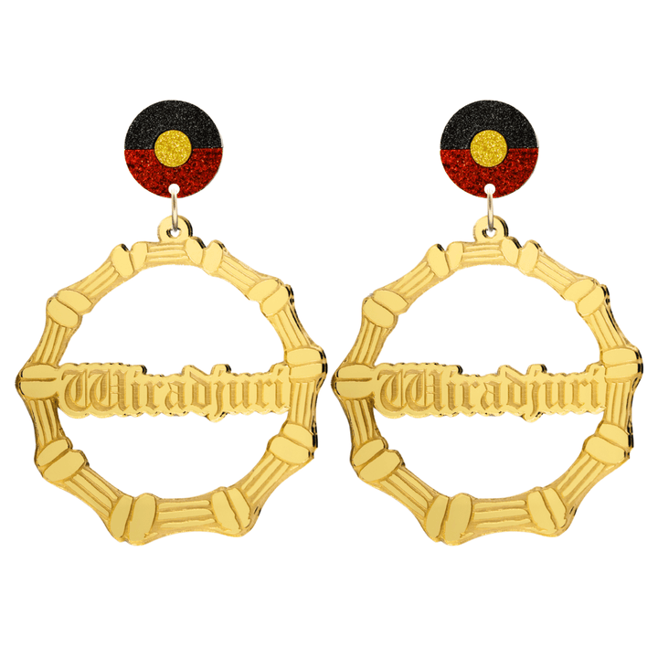 haus of dizzy gold mirror acrylic bamboo hoop custom earrings with 'Wiradjuri' old english text and Aboriginal flag design stud top size large