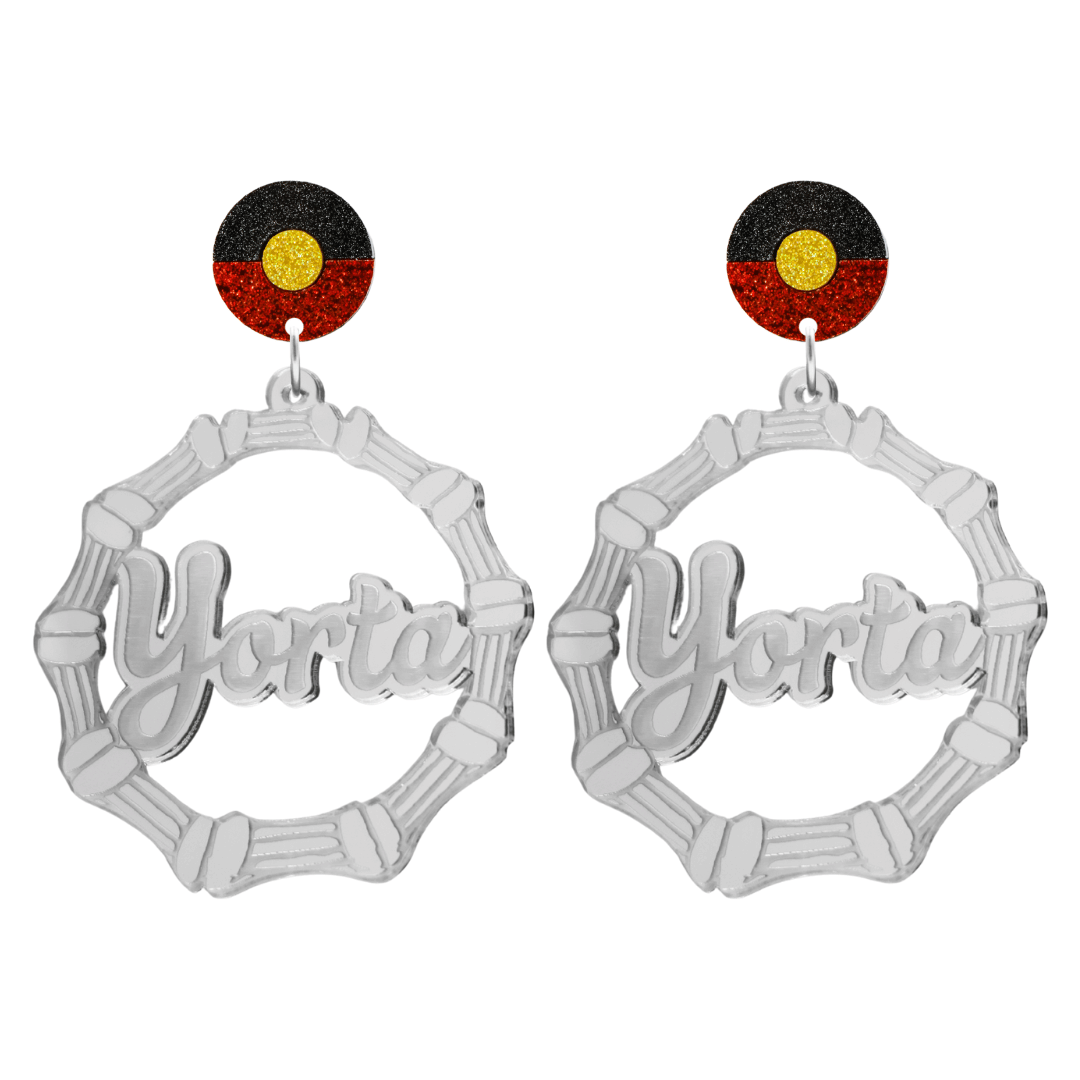 haus of dizzy silver mirror acrylic bamboo hoop custom earrings with 'Yorta Yorta' ollie cursive text (one on each earring) and Aboriginal flag design stud top size large