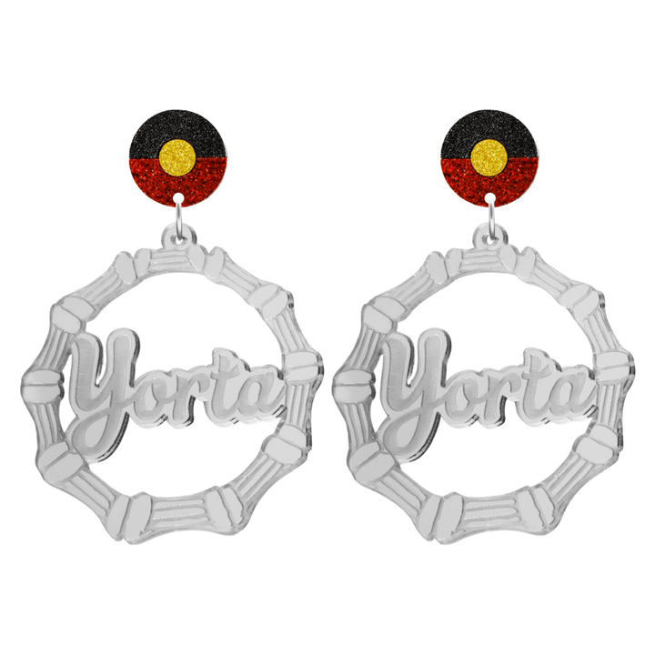 haus of dizzy silver mirror acrylic bamboo hoop custom earrings with 'Yorta Yorta' ollie cursive text (one on each earring) and Aboriginal flag design stud top size large