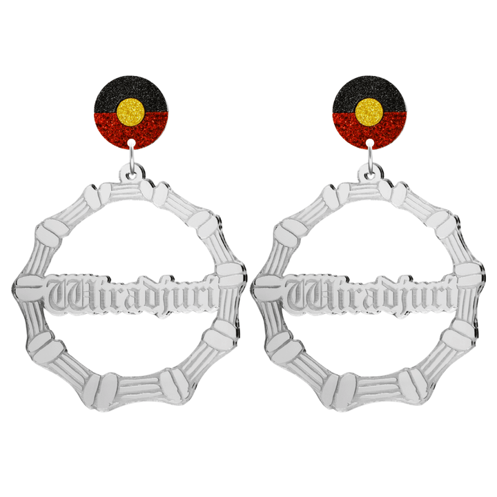 haus of dizzy silver mirror acrylic bamboo hoop custom earrings with 'Wiradjuri' old english text and Aboriginal flag design stud top size large