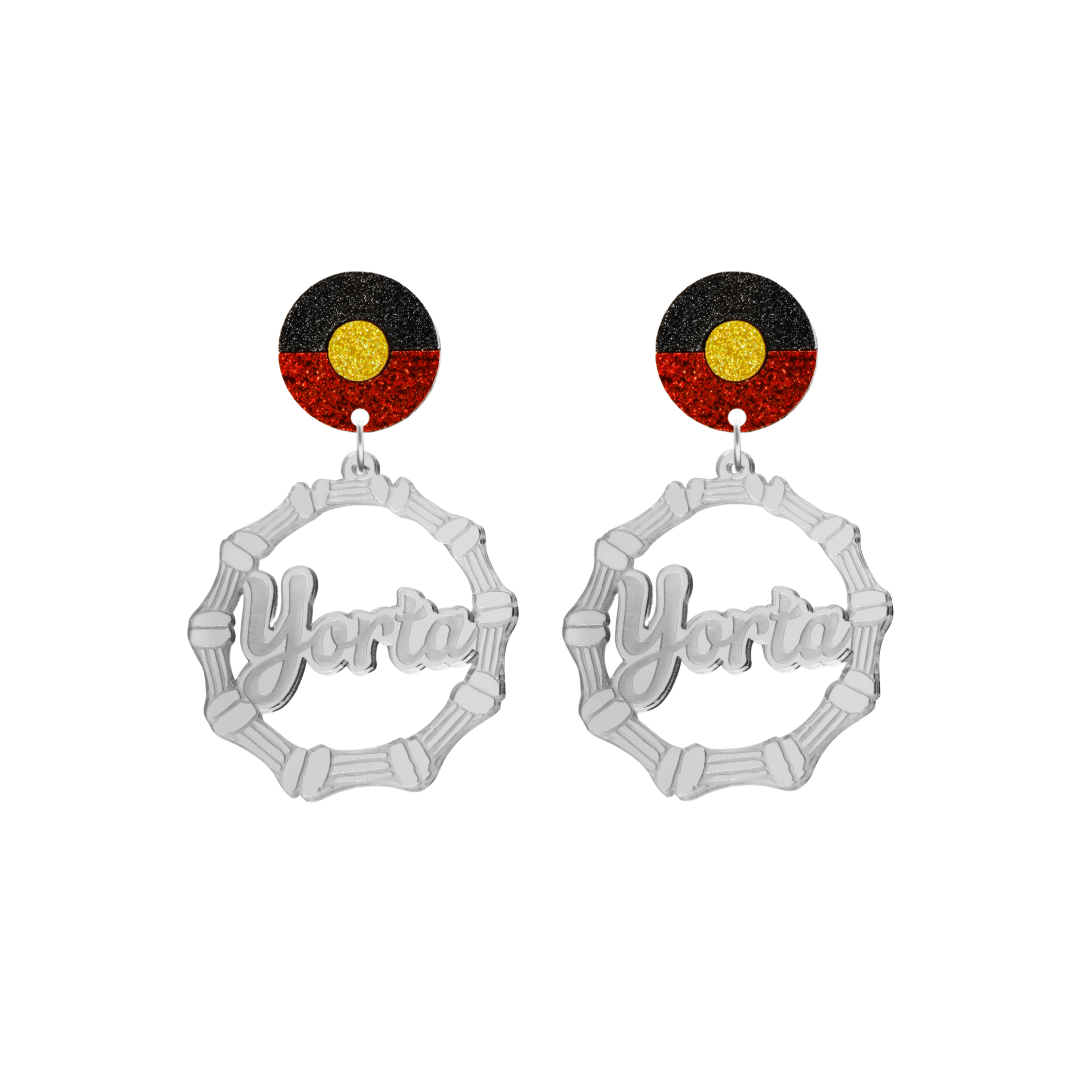 haus of dizzy silver mirror acrylic bamboo hoop custom earrings with 'Yorta Yorta' ollie cursive text (one on each earring) and Aboriginal flag design stud top size small