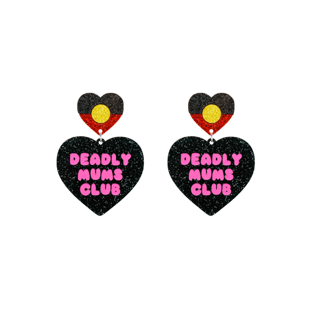 haus of dizzy earrings with a black glittery acrylic heart shape body with the phrase 'deadly mums club' hand painted in hot pink and an aboriginal flag heart stud top size small