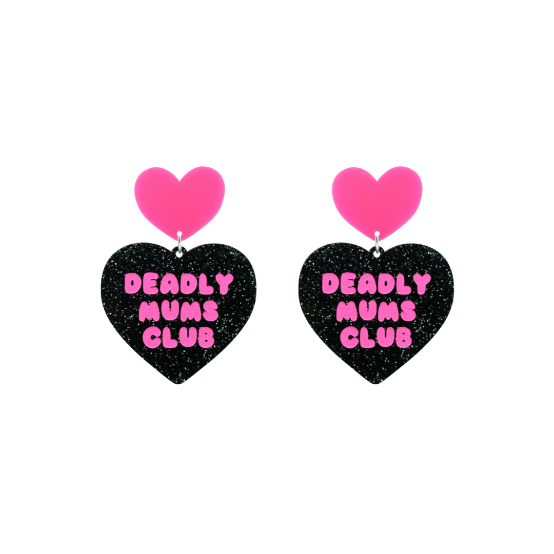 haus of dizzy earrings with a black glittery acrylic heart shape body with the phrase 'deadly mums club' hand painted in hot pink and a hot pink heart stud top size small