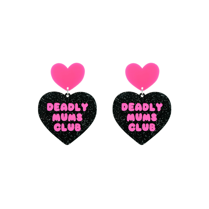 haus of dizzy earrings with a black glittery acrylic heart shape body with the phrase 'deadly mums club' hand painted in hot pink and a hot pink heart stud top size small