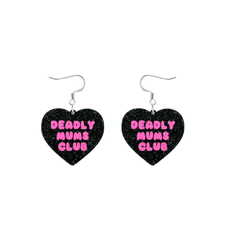 haus of dizzy earrings with a black glittery acrylic heart shape body with the phrase 'deadly mums club' hand painted in hot pink with hooks no heart tops size small