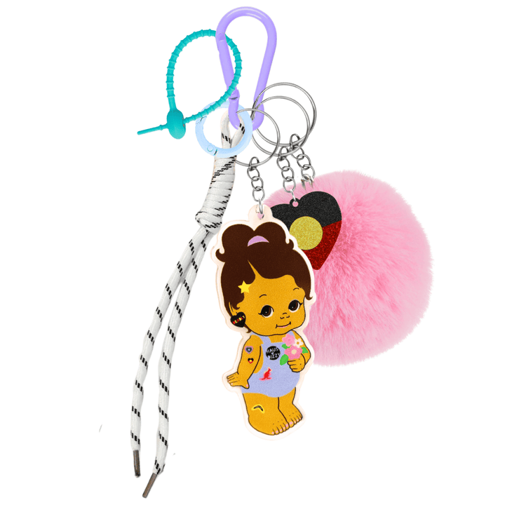 haus of dizzy dizzy chicks deluxe bag charm esme. features purple carabiner, teal rubber zip tie, baby blue circle clip, white rope, pink fluffy pom pom, acrylic glitter aboriginal flag heart charm, and printed acrylic esme dizzy chick piece