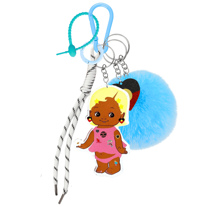 haus of dizzy dizzy chicks deluxe bag charm sissy. features baby blue carabiner, teal rubber zip tie, baby blue circle clip, white rope, blue fluffy pom pom, acrylic glitter aboriginal flag heart charm, and printed acrylic sissy dizzy chick piece