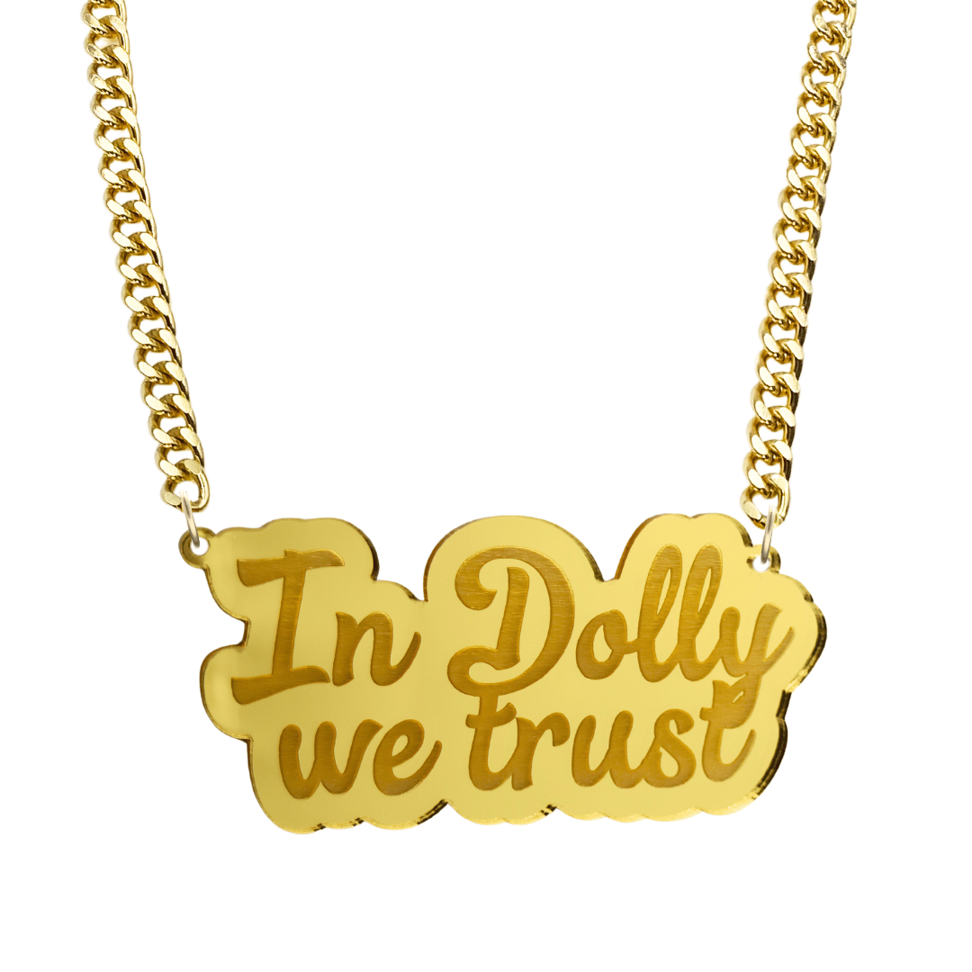 haus of dizzy gold acrylic necklace with 'In Dolly we trust' plate on gold chain size large