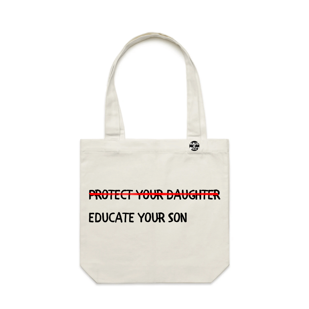 haus of dizzys off-white canvas tote bag with two shoulder straps, featuring the printed text 'PROTECT YOUR DAUGHTER' in black with a red strike-through line, and 'EDUCATE YOUR SON' below in black. A small circular logo is printed on the upper right side of the bag.