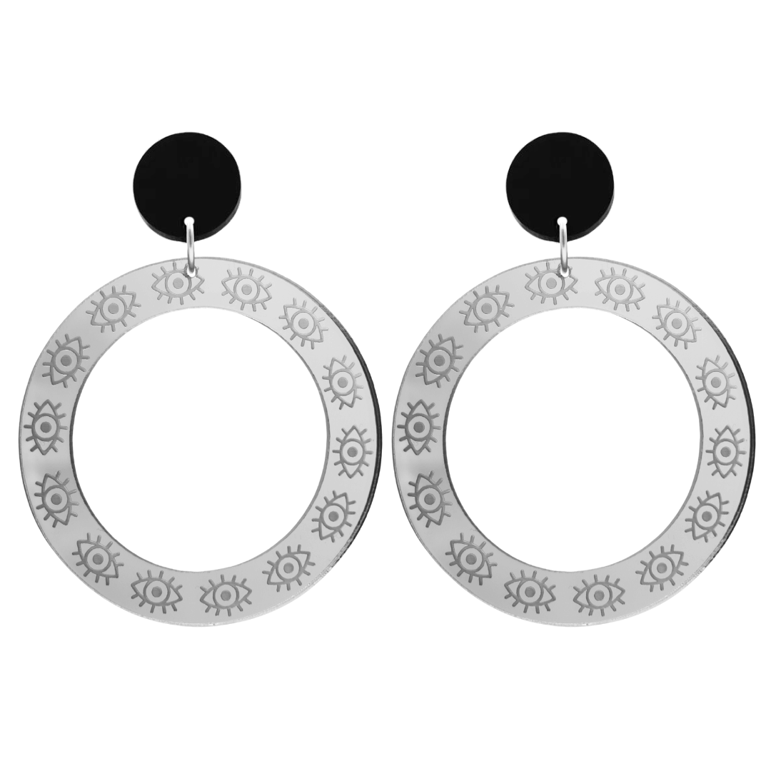 haus of dizzy silver mirror hoop earrings with etched eyes all around hoop size large with black circle tops