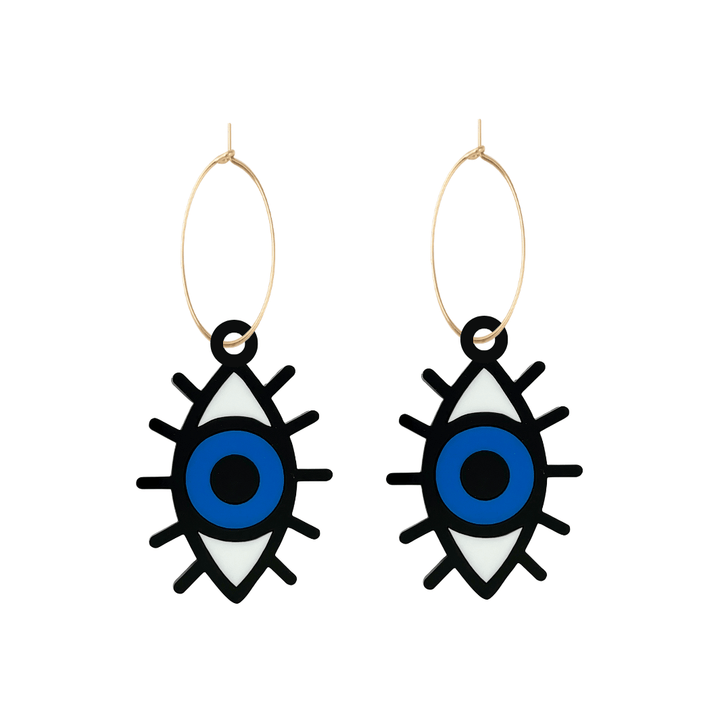 Pair of eye-shaped earrings on hoops with blue centers on a white background