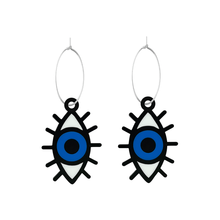Pair of eye-shaped earrings on hoops with blue centers on a white background