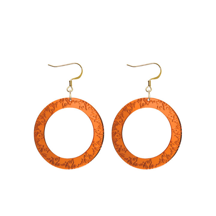 haus of dizzy orange mirror acrylic hoop earrings with flames engraved around hoop size small with hooks no stud tops