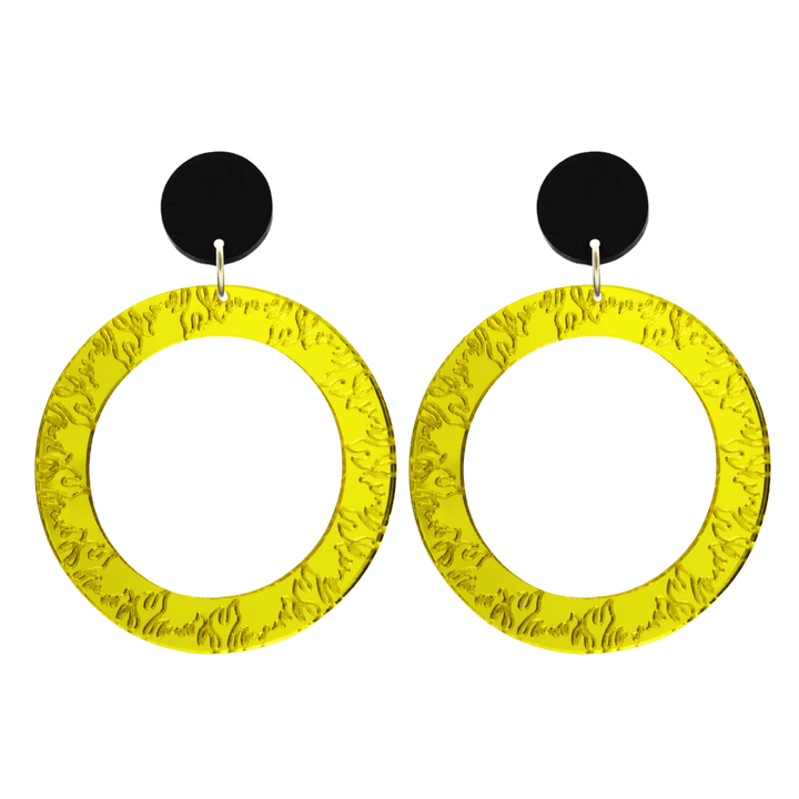 haus of dizzy yellow mirror acrylic hoop earrings with flames engraved around hoop size large with black circle stud tops