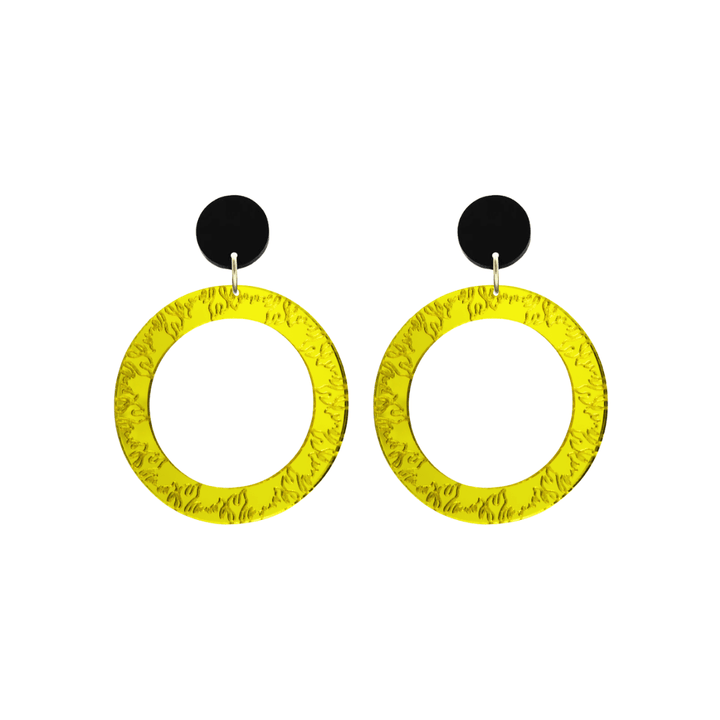 haus of dizzy yellow mirror acrylic hoop earrings with flames engraved around hoop size small with black circle stud tops