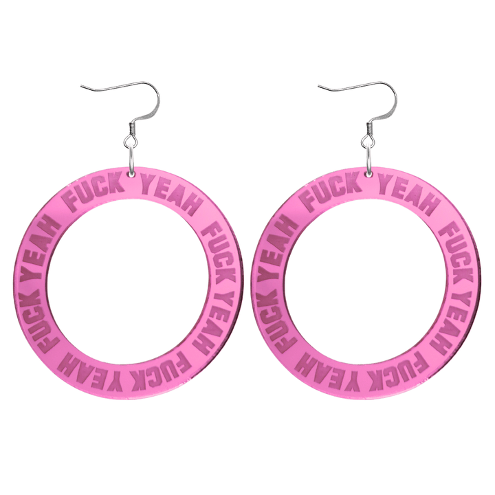 haus of dizzy pink mirror acrylic hoop earrings with 'F**K YEAH' text engraved around hoop size large with silver hooks no stud tops