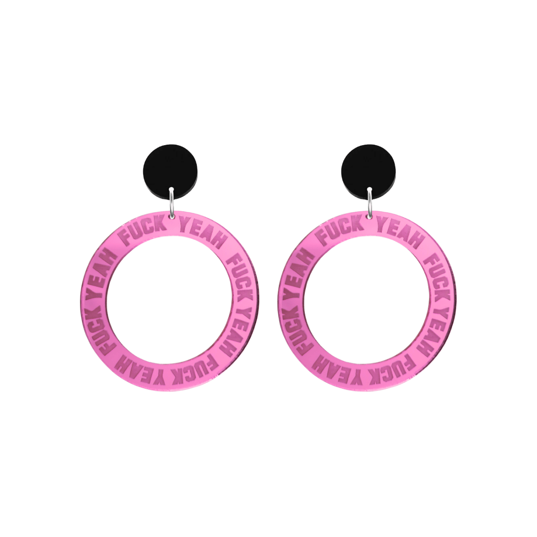 haus of dizzy pink mirror acrylic hoop earrings with 'F**K YEAH' text engraved around hoop size small with black circle stud tops