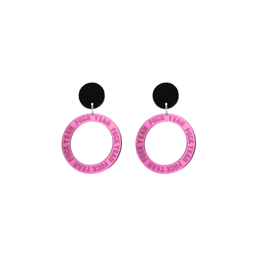 haus of dizzy pink mirror acrylic hoop earrings with 'F**K YEAH' text engraved around hoop size extra small with black circle stud tops