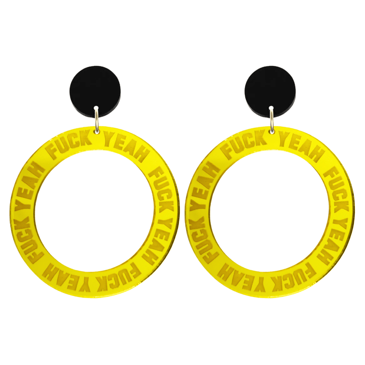 haus of dizzy yellow mirror acrylic hoop earrings with 'F**K YEAH' text engraved around hoop size large with black circle stud tops