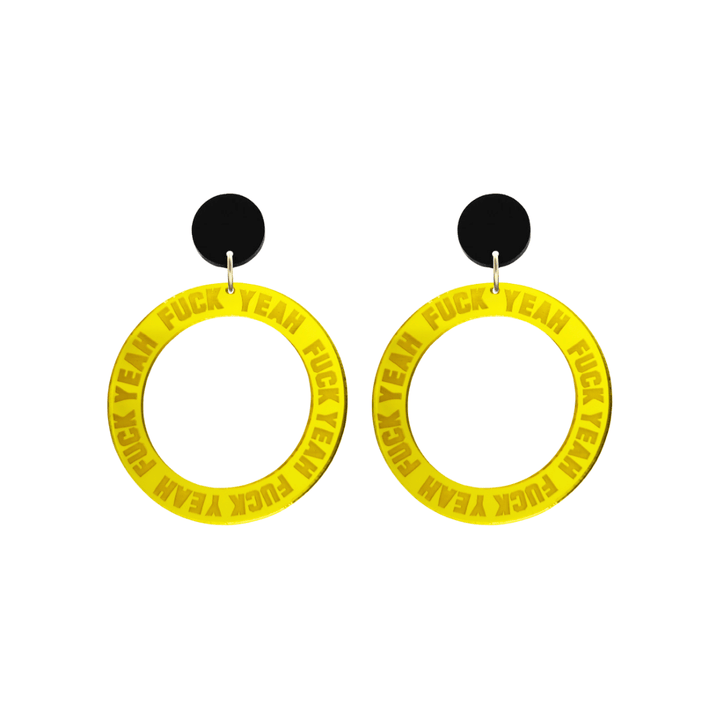 haus of dizzy yellow mirror acrylic hoop earrings with 'F**K YEAH' text engraved around hoop size small with black circle stud tops