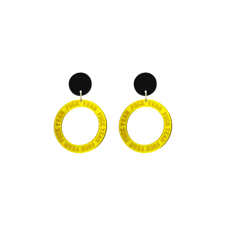 haus of dizzy yellow mirror acrylic hoop earrings with 'F**K YEAH' text engraved around hoop size extra small with black circle stud tops