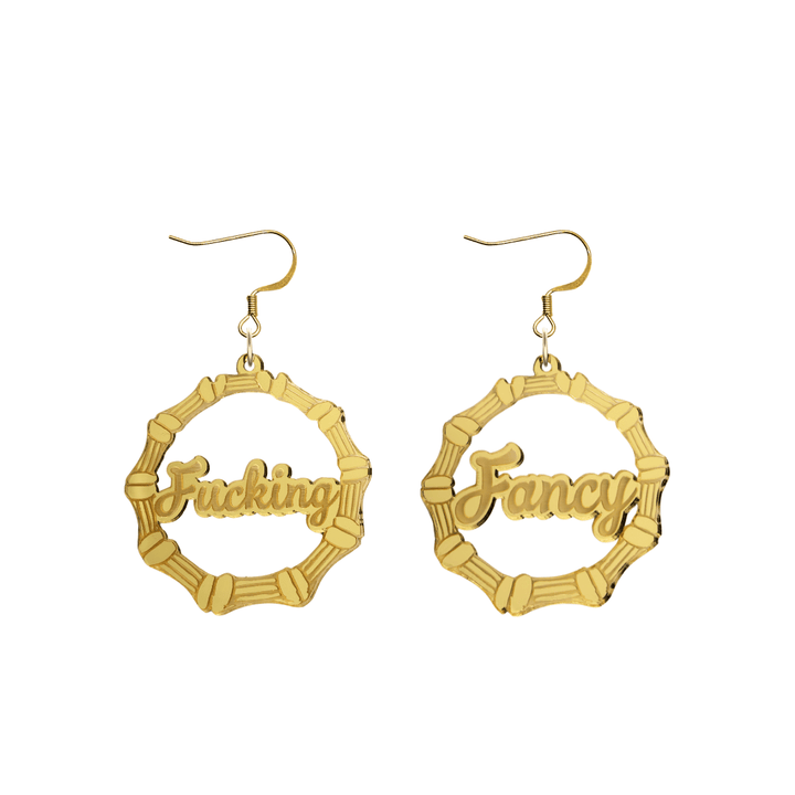 haus of dizzy acrylic gold mirror bamboo hoops with ollie cursive text that reads fucking fancy, one word on each earring, with hooks no circle stud tops size small
