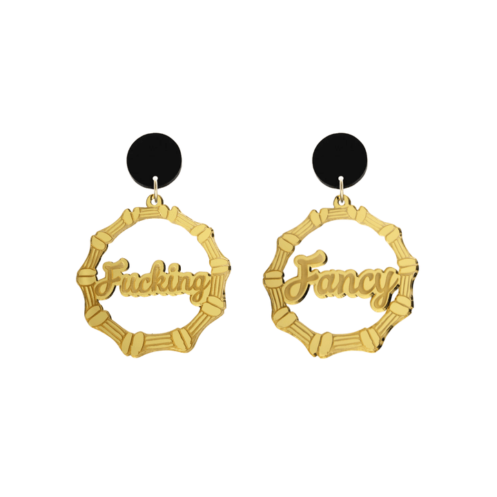 haus of dizzy acrylic gold mirror bamboo hoops with ollie cursive text that reads fucking fancy, one word on each earring, with black circle stud tops size small