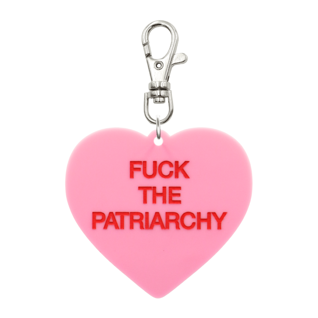 haus of dizzy pastel pink candy heart-shaped keychain with hand painted red 'F*ck the Patriarchy' text with silver parrot clasp
